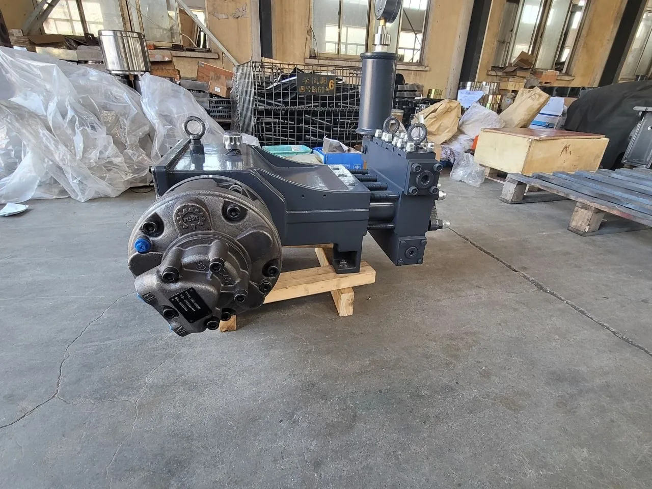 Reciprocating mud pump unit photographed in the workshop